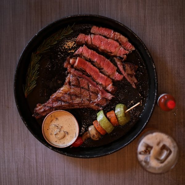 cut up steak on a plate